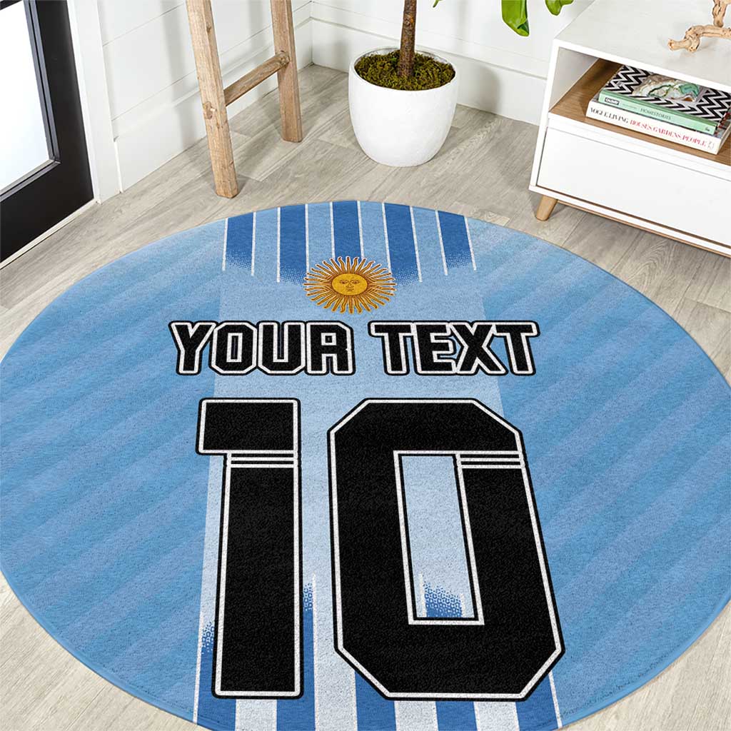Blue round football rug with 'YOUR TEXT' and large '10' graphic, sun emblem