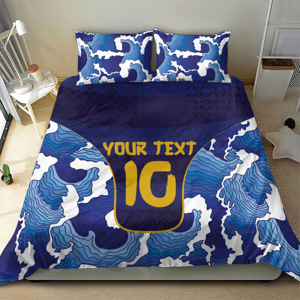 Blue bedding set with wave pattern and yellow 'YOUR TEXT' duvet design with two pillows