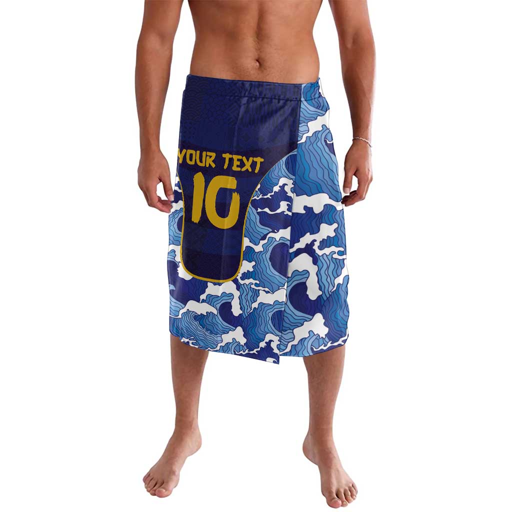 Men's blue wave-print swim shorts with elastic waistband and yellow logo text