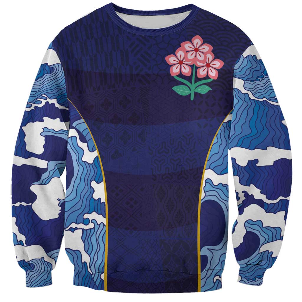 Blue rugby sweatshirt with wave sleeves and pink flower chest graphic