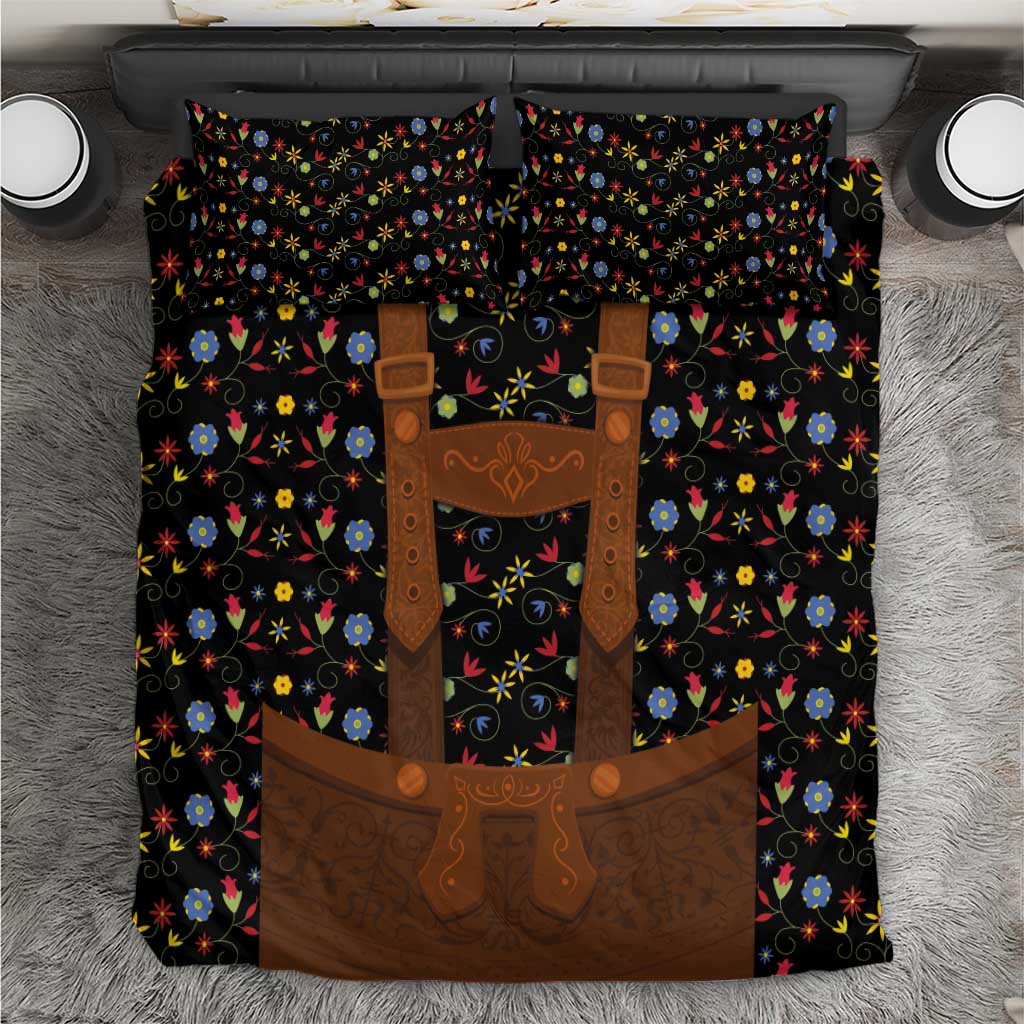 Black bedding set with colorful folk floral pattern and brown lederhosen-style appliques