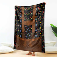 Black folk floral blanket with brown lederhosen apron front and hanging straps design