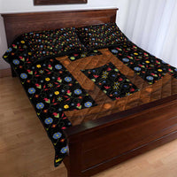Black quilt bed set with brown patchwork panels and multicolor folk floral pattern on bed