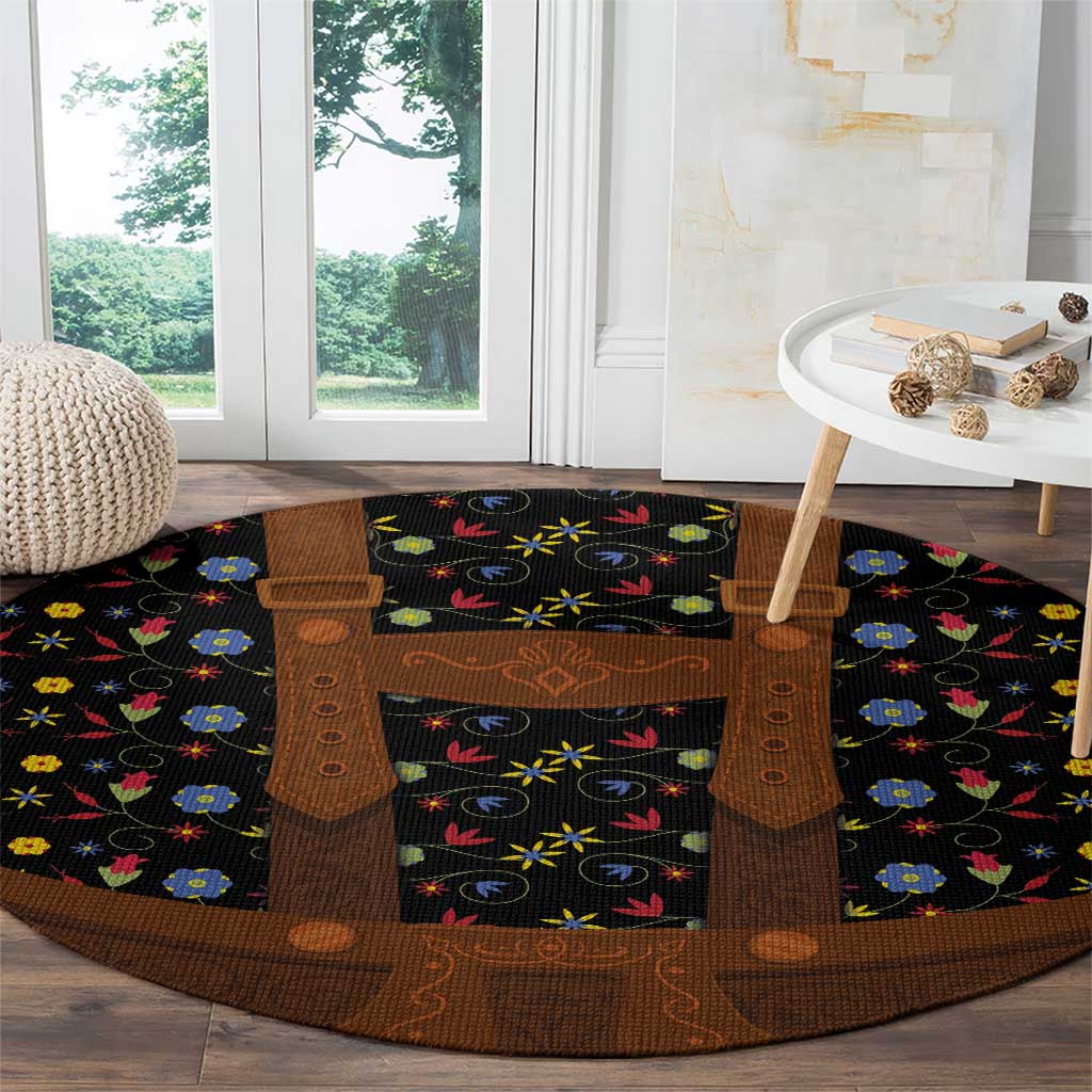Round folk floral rug with black-and-brown lederhosen motif, colorful flower pattern