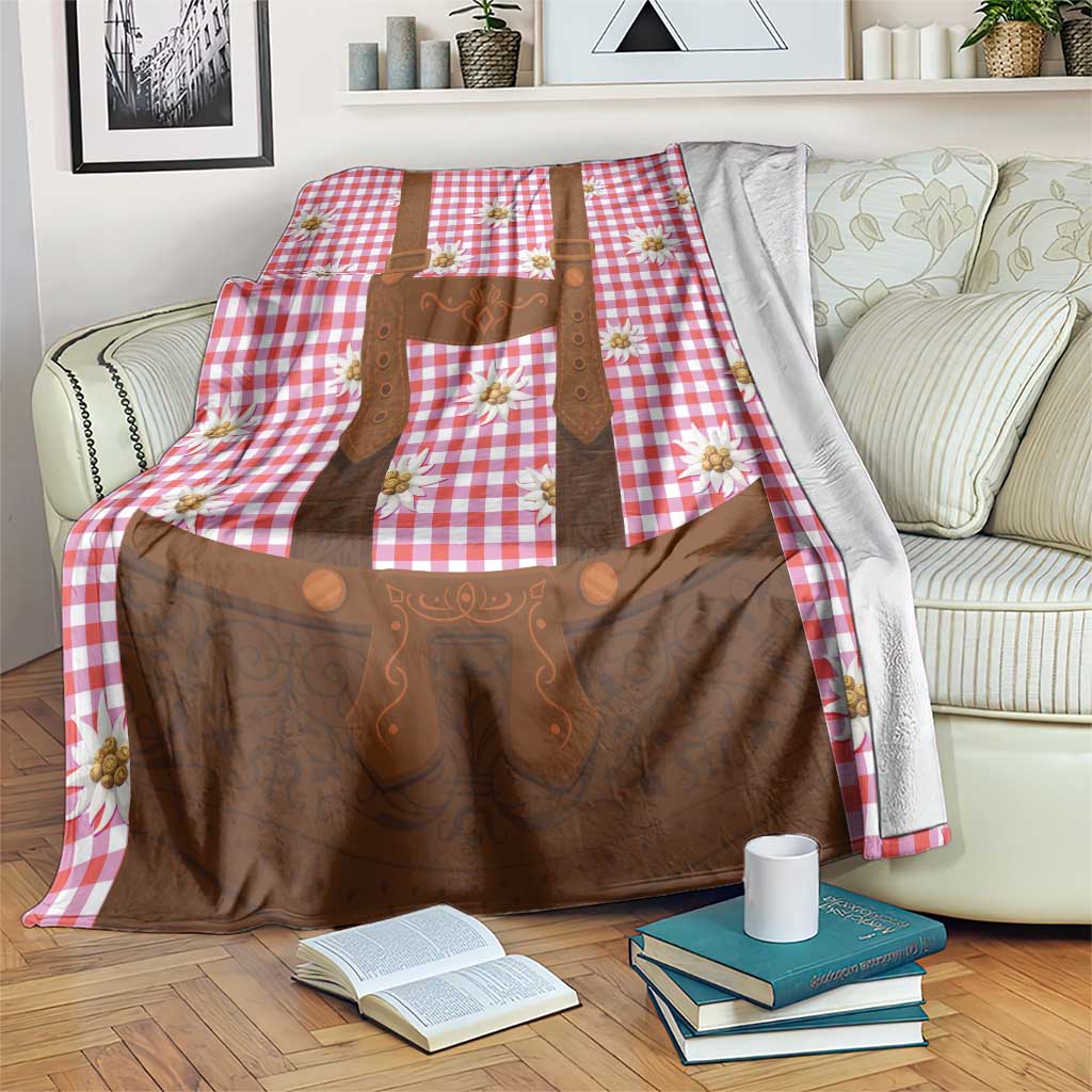 Red and white gingham blanket with brown lederhosen-style applique and daisy flowers