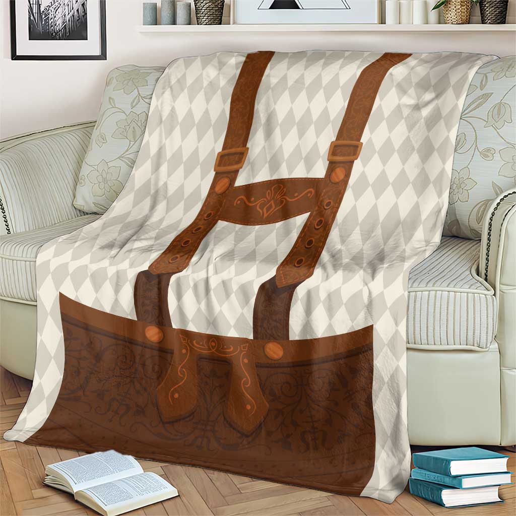 Beige diamond-pattern blanket with brown lederhosen apron and leather-style straps