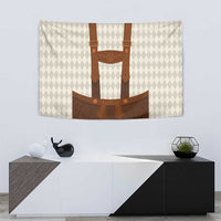 Beige decorative tapestry with brown lederhosen graphic and diamond-pattern backdrop