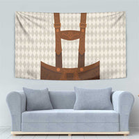 Beige wall tapestry with centered brown lederhosen suspenders and apron graphic