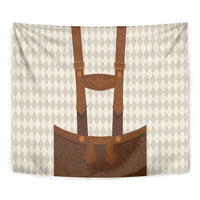 Beige wall tapestry close-up: brown lederhosen motif with diamond-pattern background