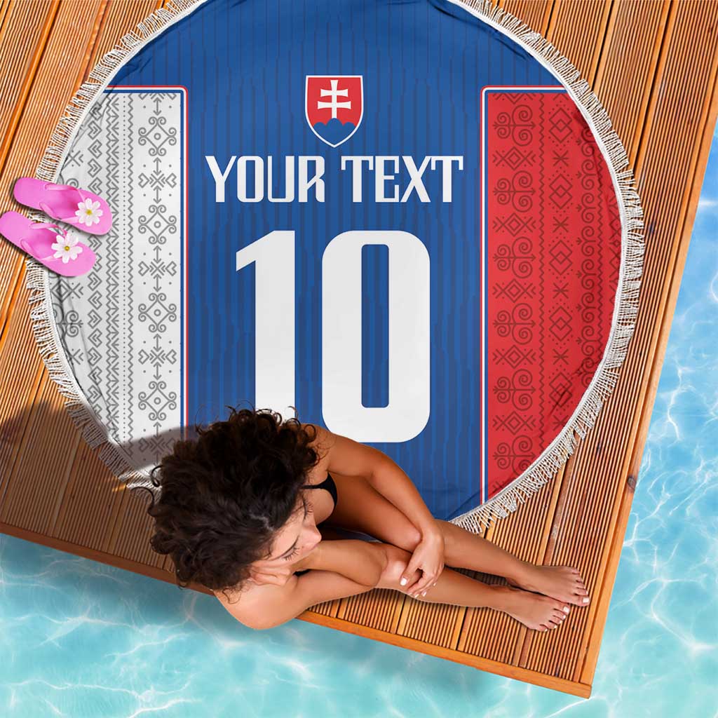 Round blue beach blanket with red/white side panels, Slovak crest, and large '10' graphic