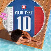 Round blue beach blanket with red/white side panels, Slovak crest, and large '10' graphic