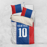 Folded blue and red bedding set with white number 10, Slovakia crest, and “YOUR TEXT”