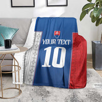 Blue, red, and white Slovakia football blanket on gray sofa with 'YOUR TEXT' and number 10.