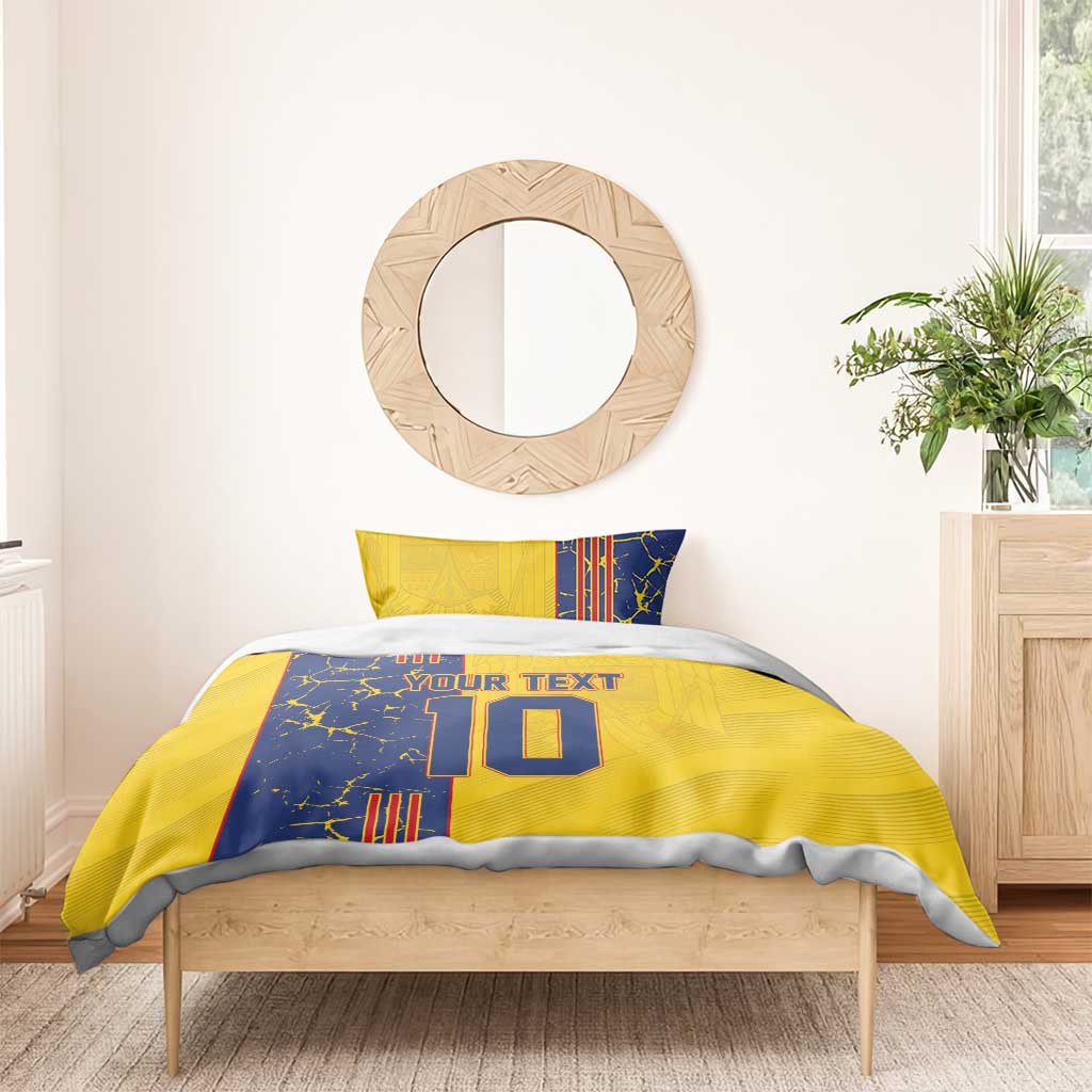 Yellow and blue bedding set with duvet cover and pillows, 'YOUR TEXT' and number 10