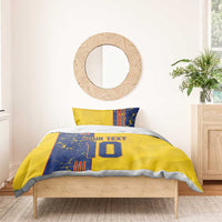 Yellow and blue bedding set with duvet cover and pillows, 'YOUR TEXT' and number 10