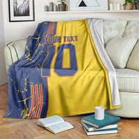 Yellow and navy football blanket with “YOUR TEXT” and number 10 graphic, draped.
