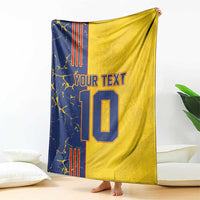 Yellow football blanket with navy panel, “YOUR TEXT” and large number 10 print.