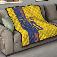 Yellow quilt blanket on gray sofa with blue panel, custom text and number 22 print