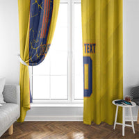 Yellow and navy curtains framing a window, navy panel shows custom text and number