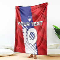 Red football blanket draped over floor, showing crest and big “10” with “Your Text”