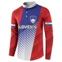 Red and blue football button sweatshirt with crest emblem, white trim, long sleeves