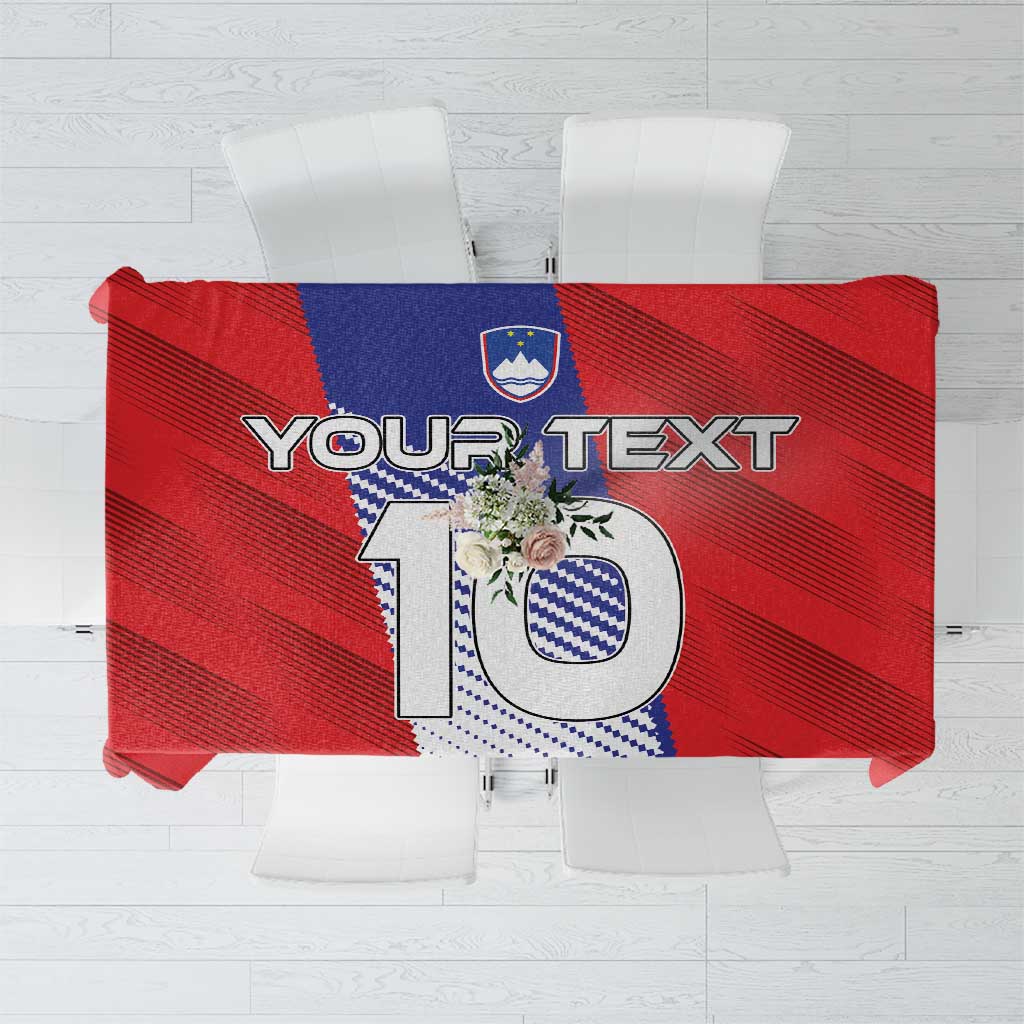 Red custom football tablecloth with blue-and-white Slovenia graphic, folded and secured.
