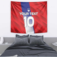 Red wall tapestry with blue center stripe, shield logo, and oversized number 10 with custom text.