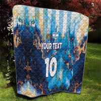 Blue football quilt on lawn with Argentina-style map, 'YOUR TEXT' and '10' number