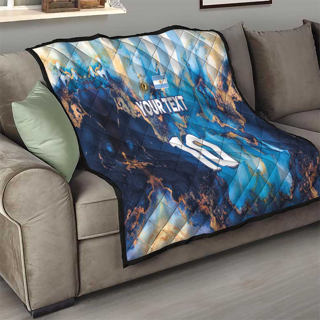 Blue football quilt draped over sofa with Argentina map, 'YOUR TEXT' and '10'