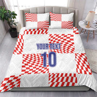 White bedding set with red check pattern, “YOUR TEXT” and number “10” centered