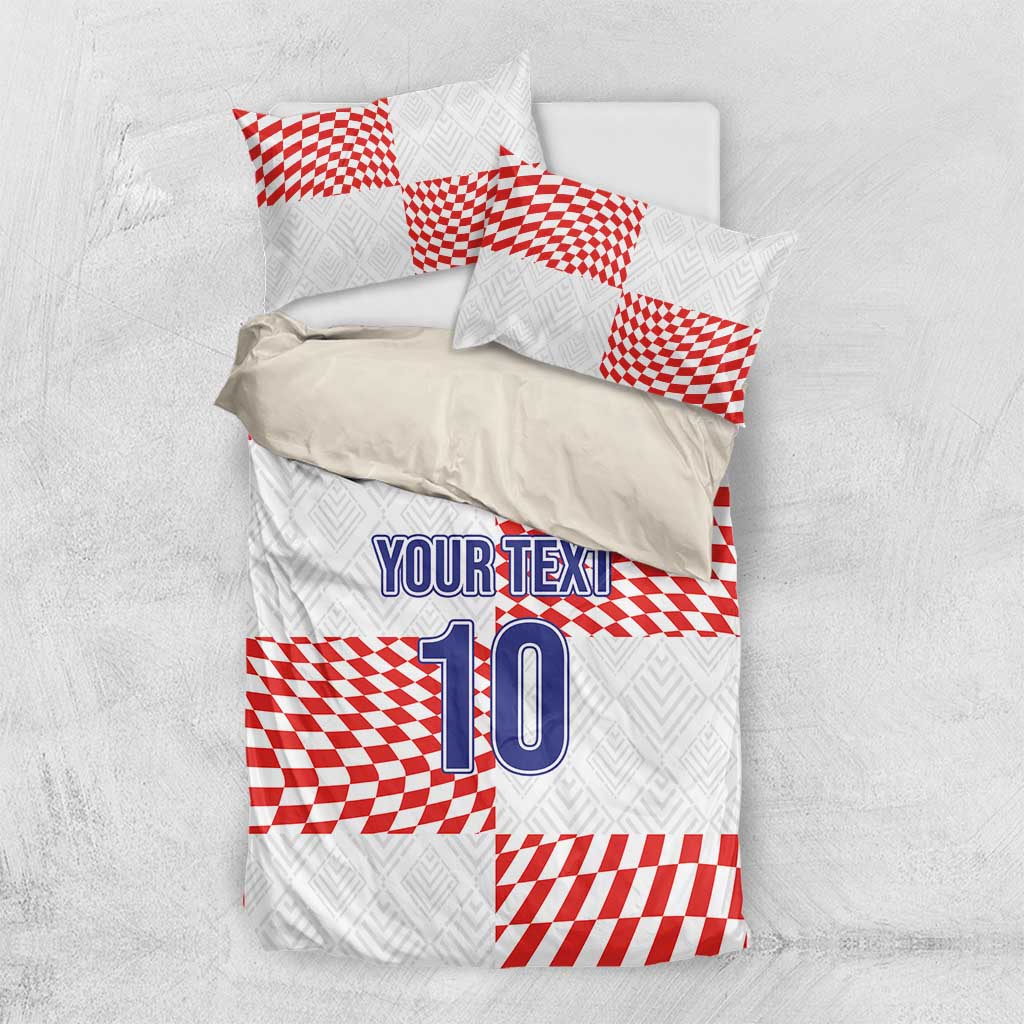 White bedding set with red check accents, “YOUR TEXT” and number “10” on duvet
