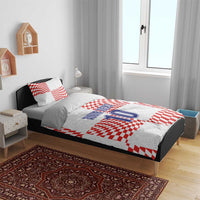 White and red check bedding set with “YOUR TEXT” and number “10” on bedspread
