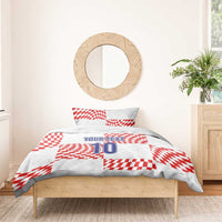 White bedding set with red check pattern and “YOUR TEXT” number “10” on duvet