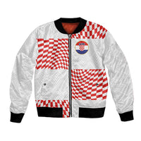 White bomber jacket with red check panels, crest patch, front zipper, ribbed cuffs
