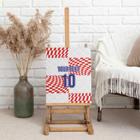 Canvas wall art leaning on a wooden easel, blue YOUR TEXT and number 10 on red checkers