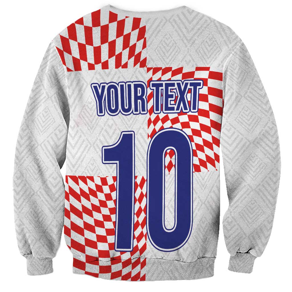 White sweatshirt with red check pattern, blue 10 graphic and your text back