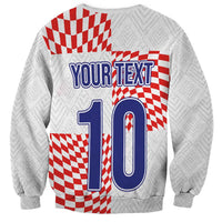 White sweatshirt with red check pattern, blue 10 graphic and your text back