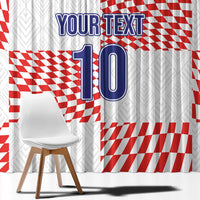 Close-up window curtain showing red checkered graphics and blue 'YOUR TEXT 10'