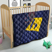 Dark blue quilted baby blanket with Barbados flag emblem and yellow diamond