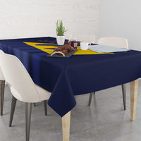 Barbados flag tablecloth on dining table with navy blue fabric and yellow diagonal stripe