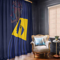 Blue curtain panels with Barbados flag print beside an armchair