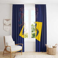 Blue curtain pair with Barbados flag print hanging in a bright room