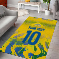 Yellow camouflage area rug, diagonal view, 'YOUR TEXT' with large blue '10'.
