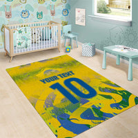 Yellow area rug in nursery, 'YOUR TEXT' with large blue '10' camo design.