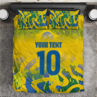 Yellow football bedding set, blue-green camo pattern with 'YOUR TEXT' and large '10' on bed.