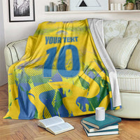 Yellow draped football blanket with “YOUR TEXT” and large blue 10, camo-style print