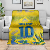 Yellow couch throw blanket with “YOUR TEXT” and blue number 10 graphic