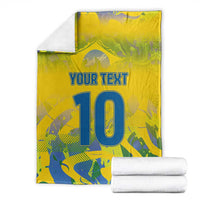 Yellow personalized football blanket with “YOUR TEXT” and blue number 10