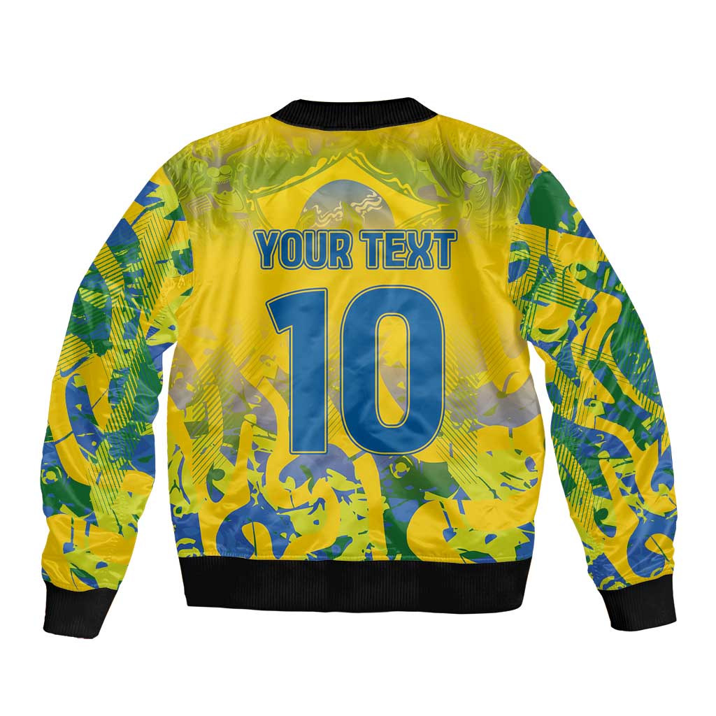 Yellow bomber jacket back with number 10, blue camo print, ribbed hem