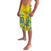 Yellow and blue custom football shorts showing 'YOUR TEXT' and number 10 at the front